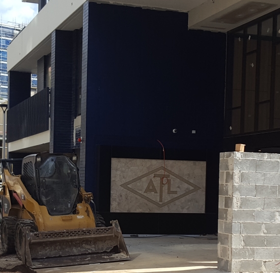 Image of ATL House with the old floor logo