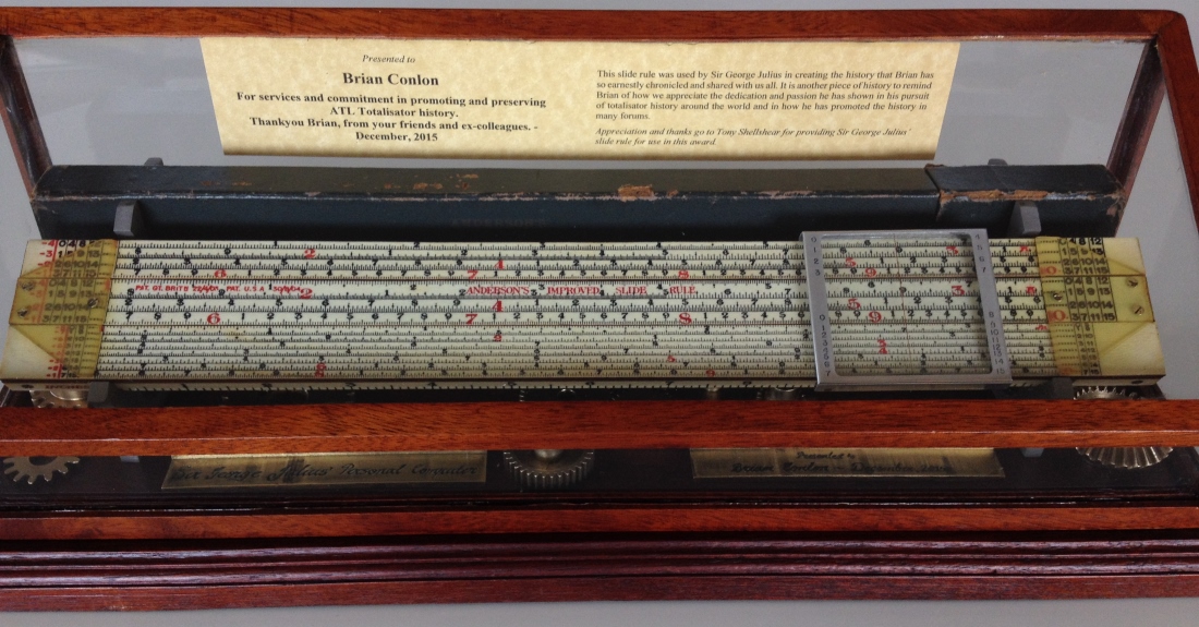George Julius' sliderule presented to Brian Conlon