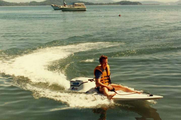 Webmaster on a surfboard image